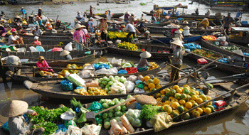Cai be floating market in Vietnam